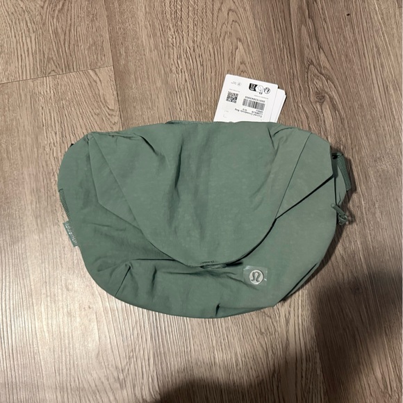lululemon athletica Handbags - Lululemon curved crossbody bag (holds a water bottle)